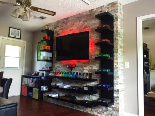 isquirtmilkfrommyeye:  So this is my new game room. My friend @r0ck3r-10 was nice enough to let me borrow the N64′s so I could take the pictures since I haven’t gotten around to buying them yet.