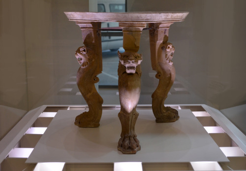 Archarological Museum of PatraA circular marble table with three legs. the short legs are decorated 