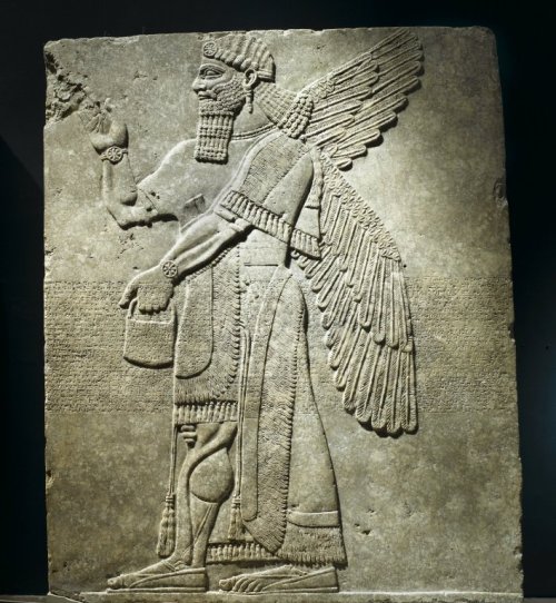 Relief of Winged Man-Headed Figure Facing Right. Made of alabaster, from Nimrud, Assyria (Iraq).&nbs