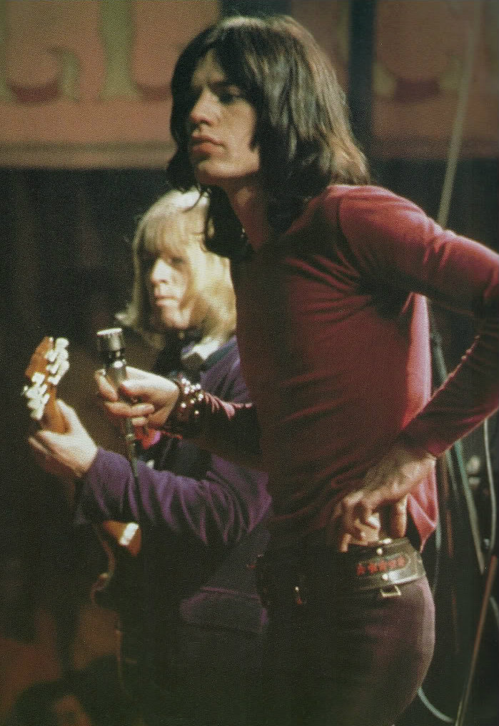 pinkfled:Brian Jones and Mick Jagger of The Rolling Stones performing at the Rock