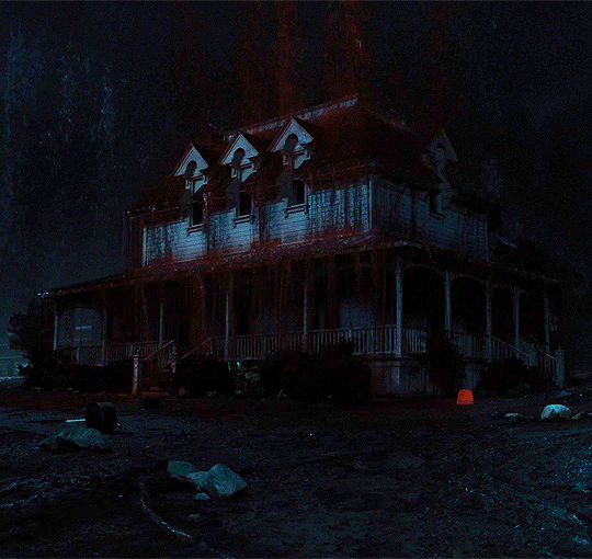A GIF of blood pouring down onto a house