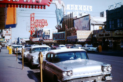 thvintage:  vintagelasvegas:   Downtown Las Vegas c. July 1960 Unknown photographer walks one block on Fremont St, crossing the street at 1st. On the board at Golden Nugget: Hank Penny &amp; Sue Thompson, Wade Ray 5, Harry Ranch, Lee &amp; Fay Maynard