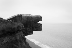 ryanpanos:  Atlantic Wall | Stephan Vanfleteren | Via As the war in Europe raged through the early 1940s, Germany built thousands of concrete bunkers to defend the continent’s western shore from an Allied sea attack. This Atlantic Wall stretched