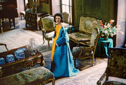 Lee Radziwill In a cape and satin dress by Nina Ricci, 1962