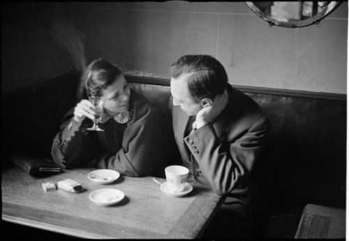 Kertesz and his wife Elizabeth huddle in a local cafe, 1931