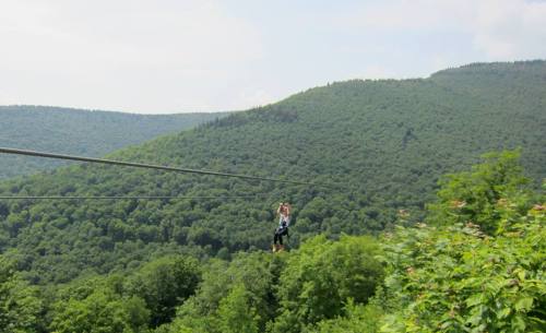 travelingwaters:  Me zip lining two summers ago at hunter mountain 600 ft up <3 it was one of the