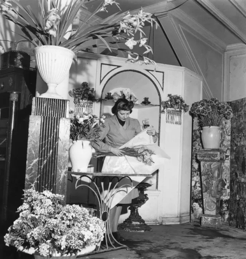 Constance Spry Wraps A Bouquet In Her Flower Shop, June 1947. Photograph: George Konig/Hulton