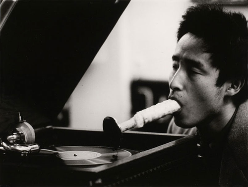 gallowhill:  Nam June Paik demonstrates “Listening to Music through the Mouth” in Exposition of Music - Electronic Television, 1963 