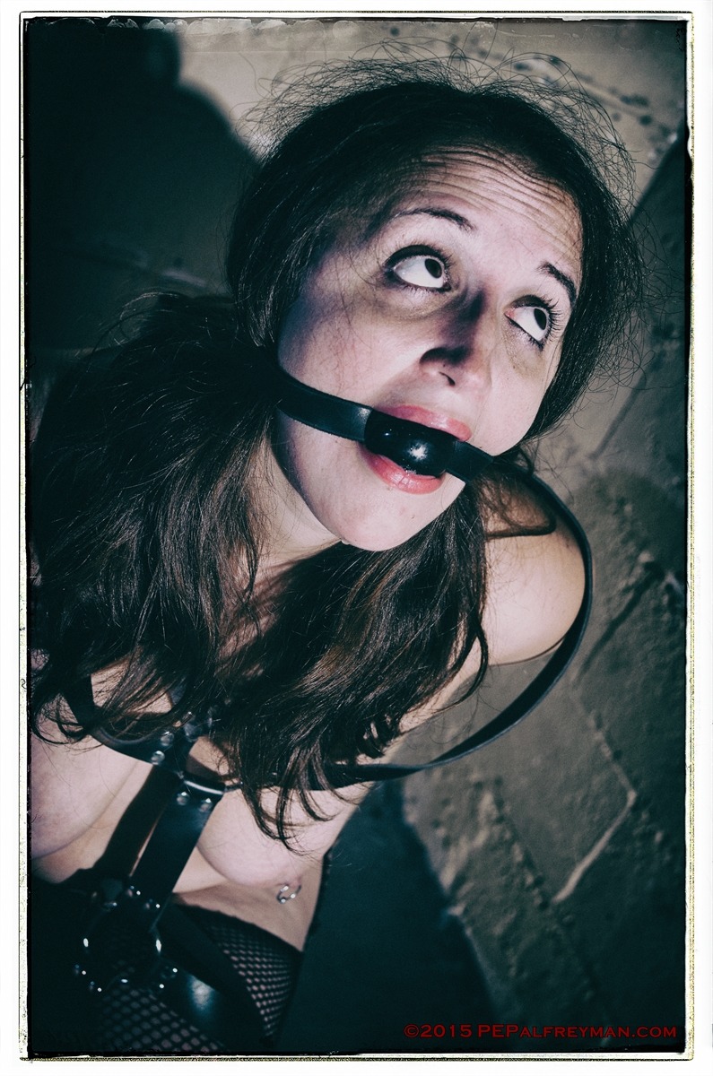 pepalfreyman:    Mab wrapped in black leather and gagged… 