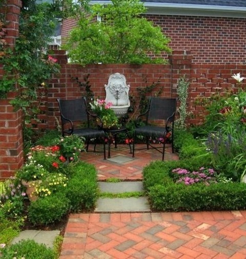 Landscape - Brick PaversInspiration For A Springtime Small Traditional Courtyard Brick Formal Garden.