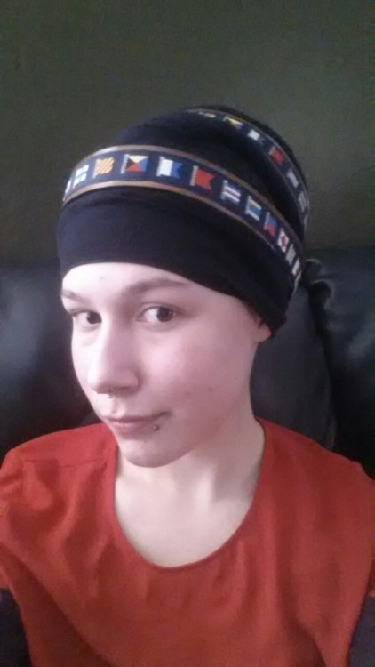 Headscarf! I’m bald now, so if I don’t wear a scarf people think I’m a skinhead, a