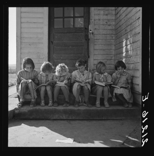 hauntedbystorytelling:Dorothea Lange :: Girls of Lincoln Bench School study their reading lesson. 