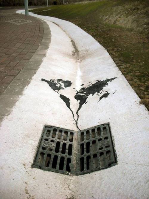 sexlane:dsrespected:stunningpicture:World going down the drain street artOmg this is amazing.