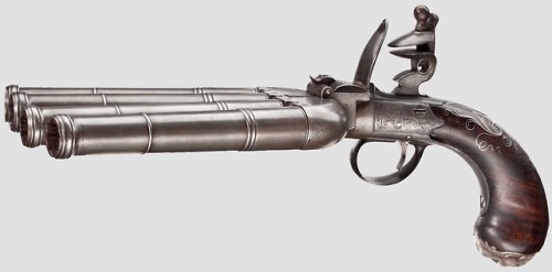 Four barreled flintlock pistol crafted by T. Richards of Birmingham, England, circa 1800.from Herman