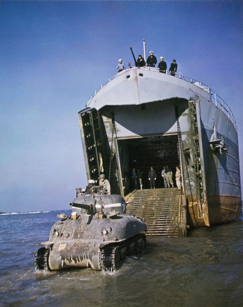 operationbarbarossa: An M4 Sherman disembarks from an LST on the beaches of Anzio during the amphibi