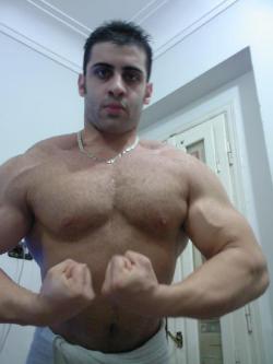 Biceps are great as is his pecs and nips