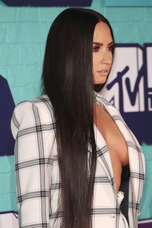 DEMI LOVATO’S TITS HANGING OUT AT THE MTV EMAS - 2017