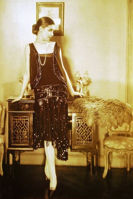 prompthunt: fashion photography, a flapper dress by Coco Chanel, color  photography