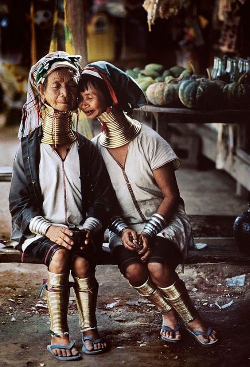 sartorialadventure: These Kayan women, from Kayah state of Myanmar, wear brass coils around their ne