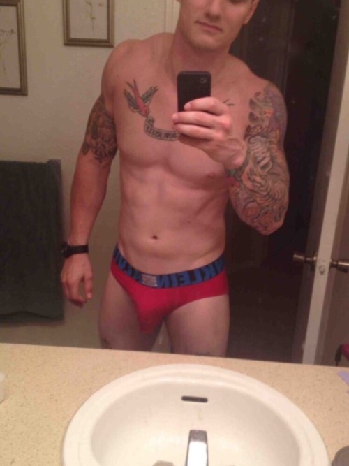 queerclick:See the tats on his ass up close. Plus he lets out his stiff erected cock.