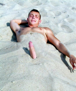 bareandshare:  Cock poking out of sand at