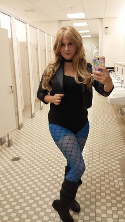 Selfshot of a sexy girl with blue pantyhose and black fishnet pantyhose under leotard.Selfie in pant