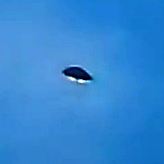 anythingufo:  Teenagers in Brazil Capture UFO Sighting on Video  Teenagers playing with a camera caught one of the latest UFO sightings in Brazil on video over the town of Minas Gerias. While they were trying out their new camera zooming in and out of