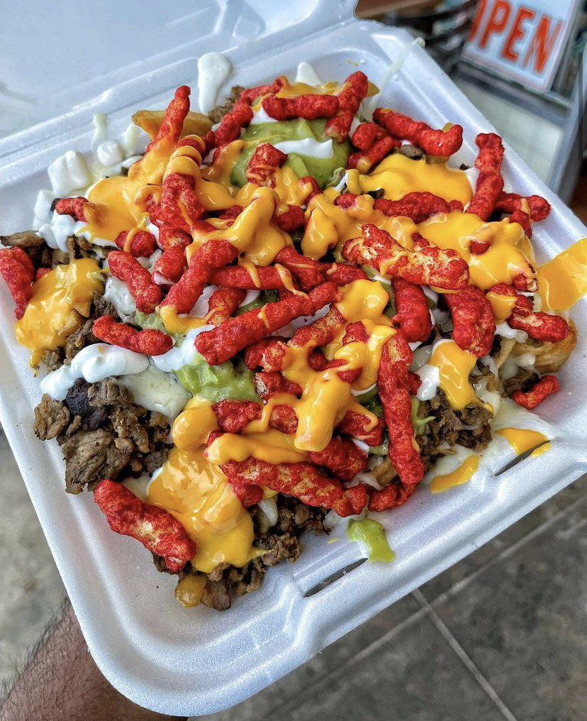 everybody loves to eat — hot Cheeto carne asada fries (source)