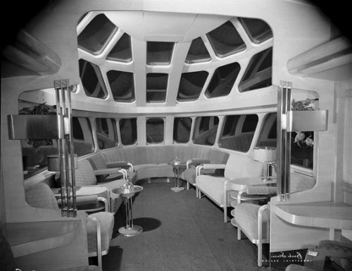 thevaultoftheatomicspaceage: 1948 publicity photo of a Chicago, Milwaukee, St. Paul & Pacific Railroad Skytop lounge car.