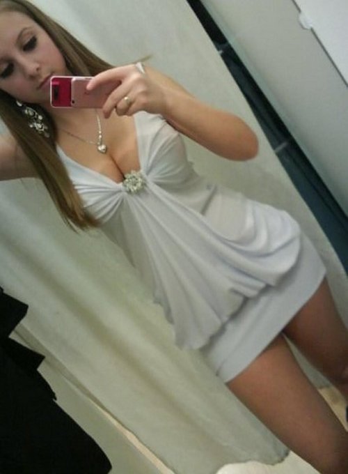 Teen girl in tight dress selfie