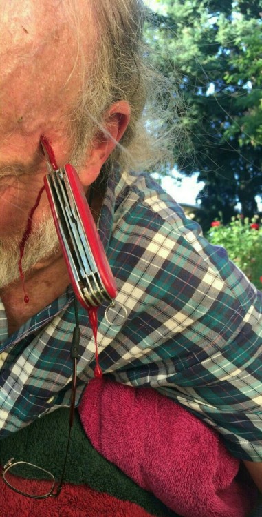 lexlexpdx - Middle aged man, walking with an open pocket knife,...