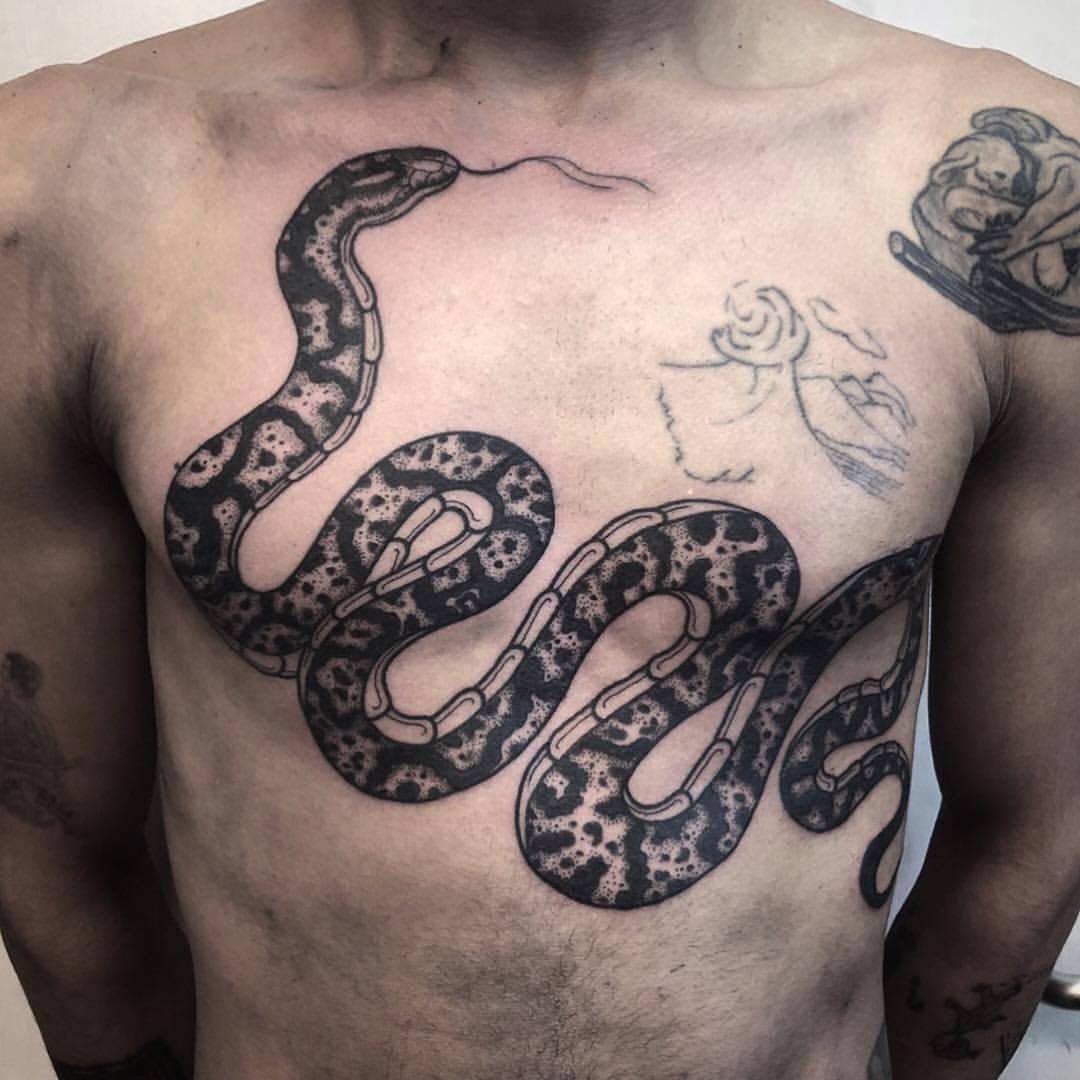 snake tattoo | Chest tattoos for women, Small chest tattoos, Chest tattoo  men