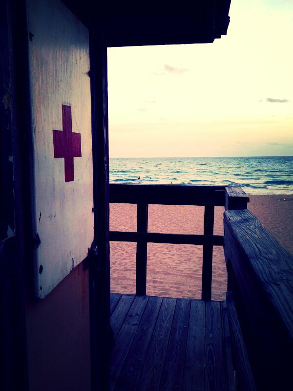 Chillen in the east coast of FL on top of a life guard tower as the sun goes down.