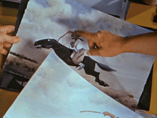 adventurelandia:Florencio Molina Campos and Walt Disney looking at Campos’ gaucho paintings in Salud
