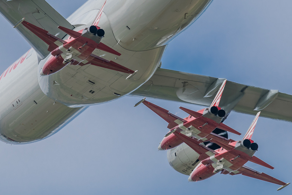 Patrouille Suisse flying their F-5Es in trail behind their bigger civvy brother, the SwissAir Airbus A330. Awesome snap by Peter Gronemann.