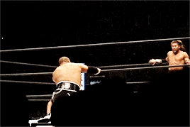 mith-gifs-wrestling:  Kenny Omega gets blocked by Tomohiro Ishii.
