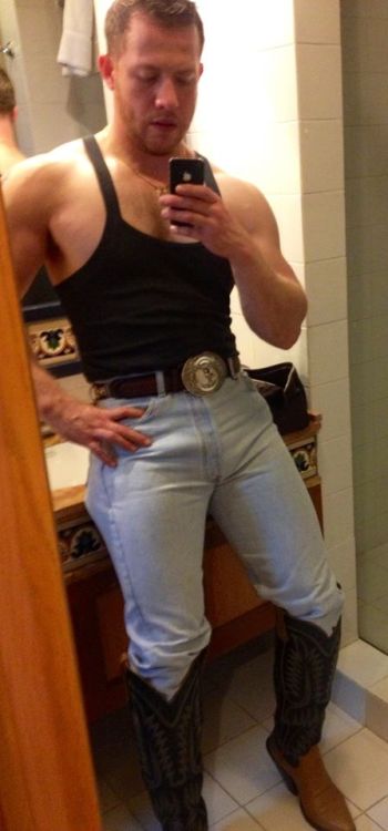 bootslaveboyusa:  Yeah cowboy the taller the boots the more to make this faggot lick.