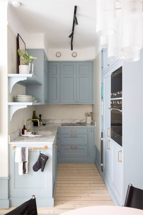 A Small Stockholm Apartment With A Blue Shaker Kitchen