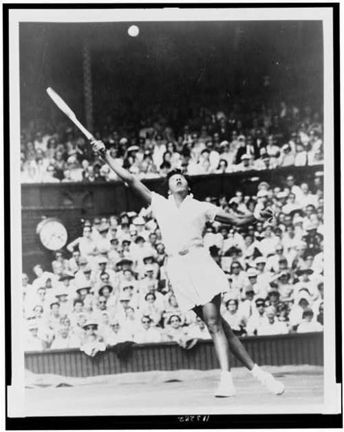 “ Althea Gibson, of New York, reaching high for shot during women’s singles semifinal match against Christine Truman, of England, in All England Lawn Tennis Championships at Wimbledon, England, July 4, 1957.
”
Althea was the first black person of any...