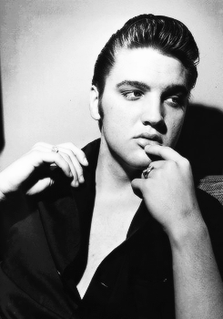 vinceveretts:  Elvis photographed by Tony Spina in his room at Detroit’s Sheraton-Cadillac Hotel, May 25, 1956. 