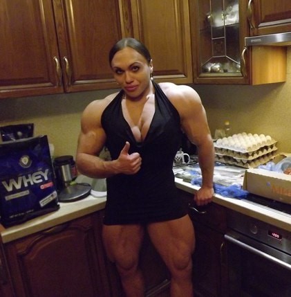 zimbo4444:  ..Natalia Trukhina..”The World’s Most Muscular Woman”..super strong & super beautiful & only 24yo..slightly over 5'5” tall 211 lbs & has over 18″ biceps.. 💪🏼😺👍🏼 ..Jr. proudly says..”my Mom can beat up