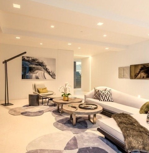 Open Family Room New YorkAn Illustration Of A Sizable, Modern, Open-concept Family Room With White Walls,