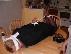 skirtnapper:When my wife came home she was stunned to she her sister Bound, Gagged and blinfolded on our kitchen table