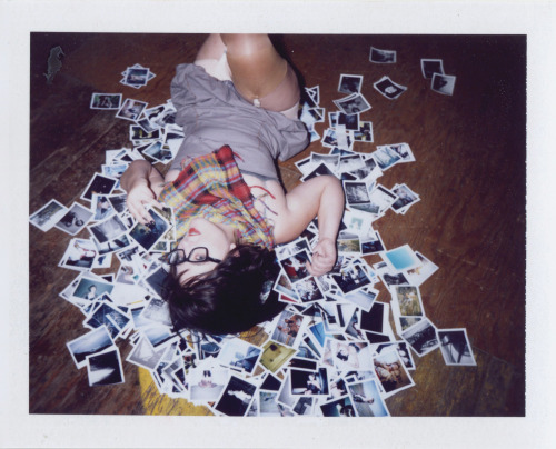 Here’s me, being cuddly with my Polaroids. 