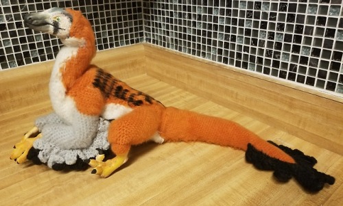 asleepymonster:Velociraptor doll made from sculpy and crocheted parts. It’s coloration is base