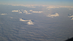 sixpenceeeblog:Mountain tops above clouds.