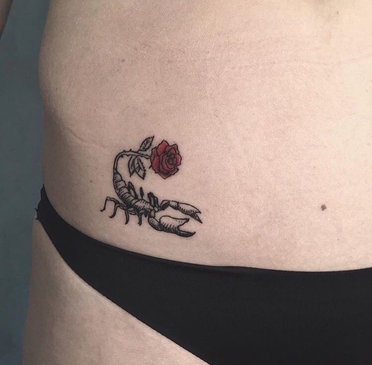 I used to care that I was a Scorpio. Now I think this tattoo is dumb.  Thoughts on cover ups/improvements? : r/shittytattoos