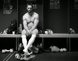 Men in rugby and footy socks