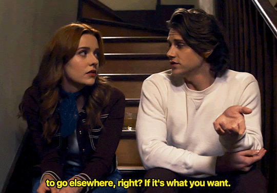 GIF FROM EPISODE 3X01 OF NANCY DREW. NANCY AND ACE ARE SITTING SIDE-BY-SIDE ON THE STAIRS IN NANCY'S HOUSE. THEY'RE LOOKING AT EACH OTHER. ACE SAYS "TO GO ELSEWHERE, RIGHT? IF IT'S WHAT YOU WANT." THEY LOOK AWAY FROM EACH OTHER, TO LOOK DOWN. THEY BOTH LOOK SAD. 