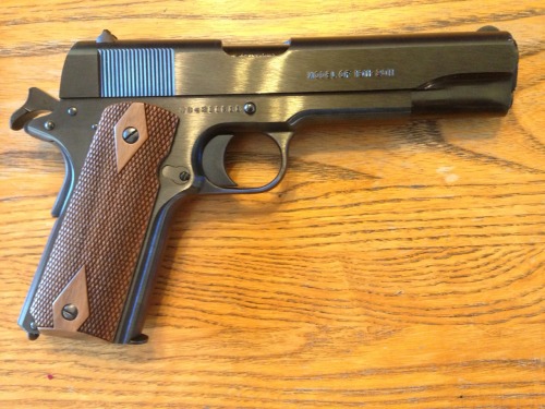 cerebralzero:  dr-joe:  I bought a 1911! It’s a Colt 1911 100 year anniversary model (Series 70 trigger), model O1911ANVIII. It’s an all steel, completely blued, classic 1911 exactly like I wanted. I wanted to buy one of these a long time ago but